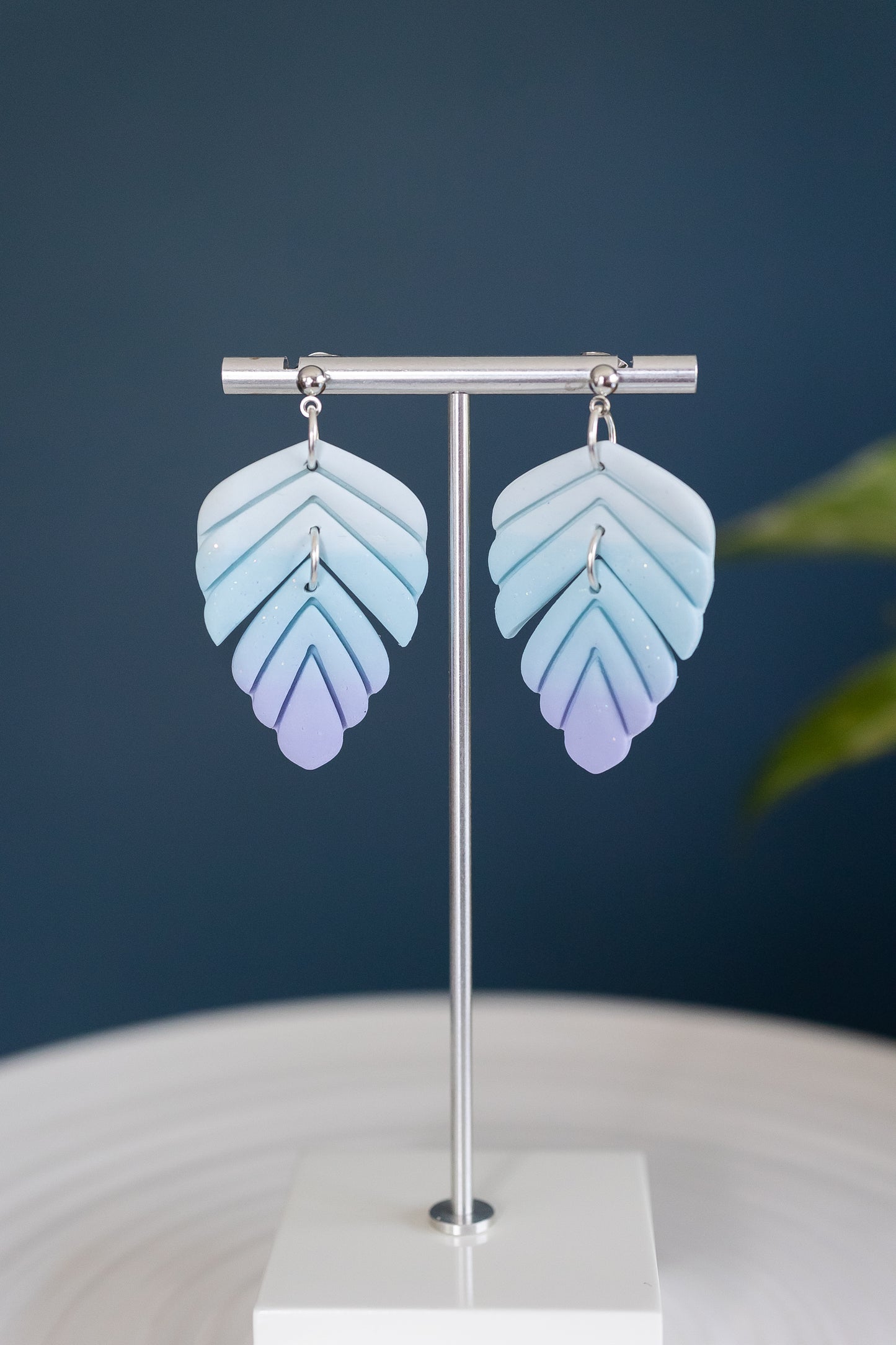 blue and purple ombre polymer clay earrings in the design named heather